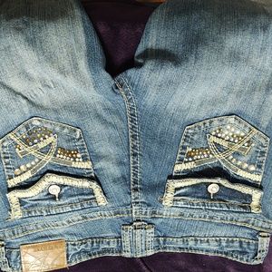 Amethyst . Low rise skinny jeans with bling flap pockets. Size 13 Junior.